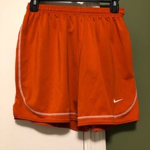 Nike orange soccer/running shorts